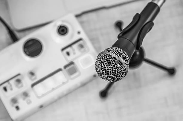 istock podcast recording devices and microphone 2207976133