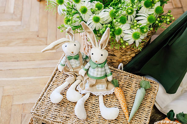 istock Decorated bunnies and flowers in a cozy setting during springtime celebration 2207978930