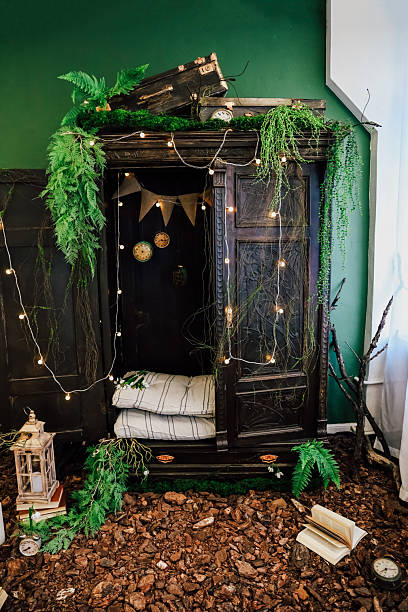 Creative indoor forest-themed wardrobe with fairy lights and natural decor elements