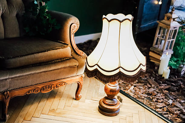 istock Vintage lamp complements elegant seating in cozy interior setting with natural elements 2207979150