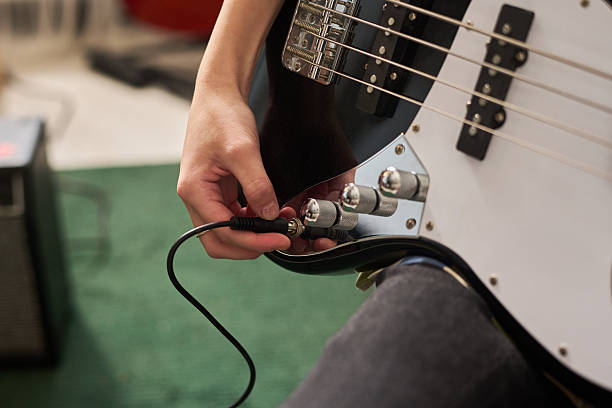 Adjusting Guitar Controls on Electric Instrument