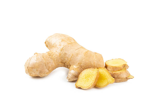 istock Fresh ginger and lemon isolated on white background. Sliced ​​ginger. Ginger root. Traditional alternative medicine, healing tea for immunity. Close-up. 2207980983