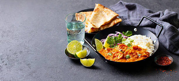 istock Kerala prawns curry in black bowl. Grey background. Copy space. 2207983460