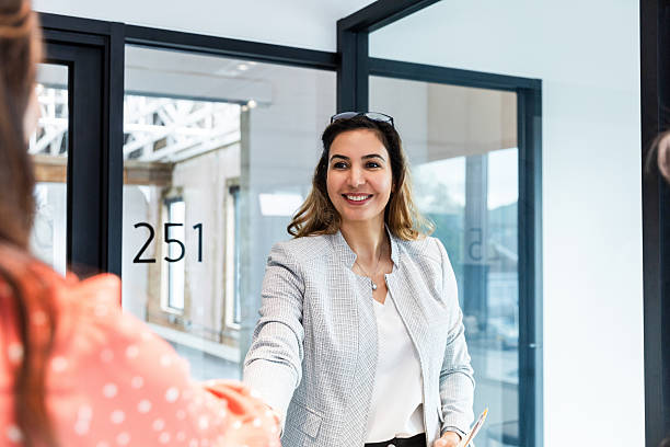 istock Businesswoman Shaking Hands,  Modern Office Meeting 2207984041