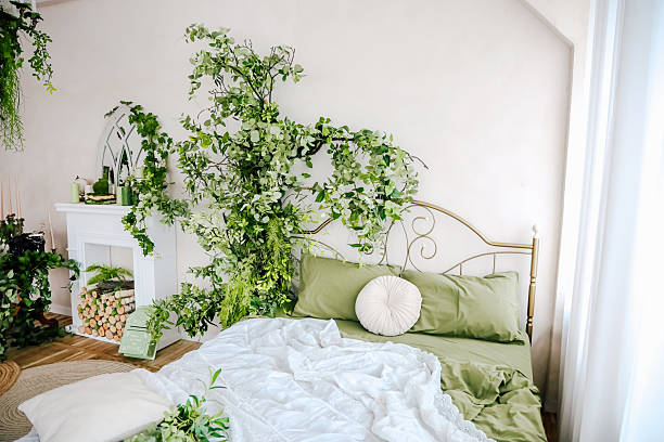 istock Cozy bedroom with lush greenery and natural decor in a peaceful setting 2207984256