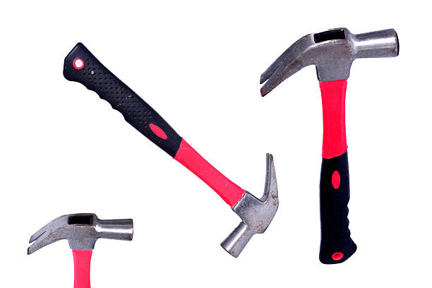 iron hammer with injected plastic handle construction tool hammering nail nailing wood carpentry and construction