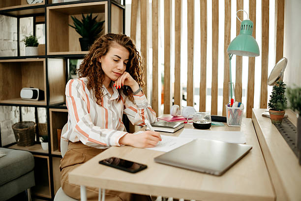 istock Businesswoman working at the office 2207990280