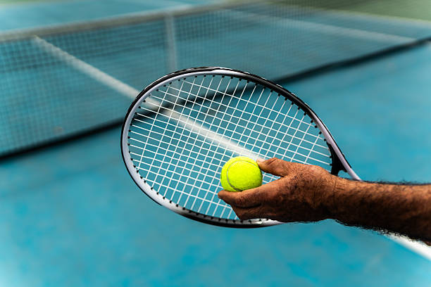 istock Close-up of man playing tennis 2207990725