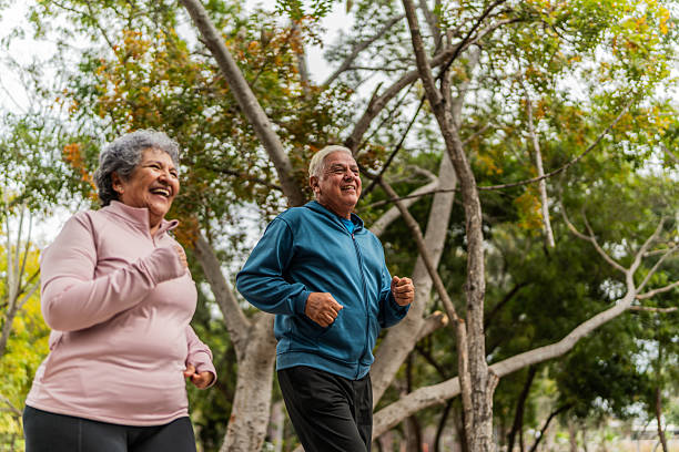 istock Senior couple talking and running on public park 2207991093
