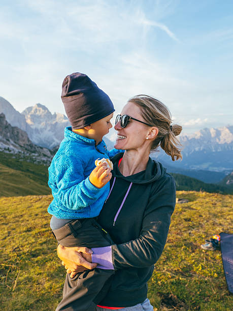 istock Mother and Son Smiling Together in the Dolomites Mountains 2207992065