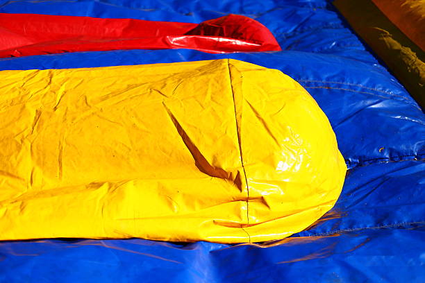 Sports inflatable structure. Amusement park. Trampoline for jumping. An obstacle course for children.