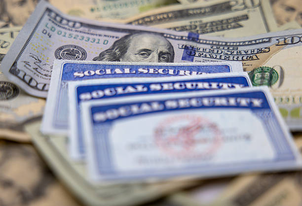 Social Security cards over money