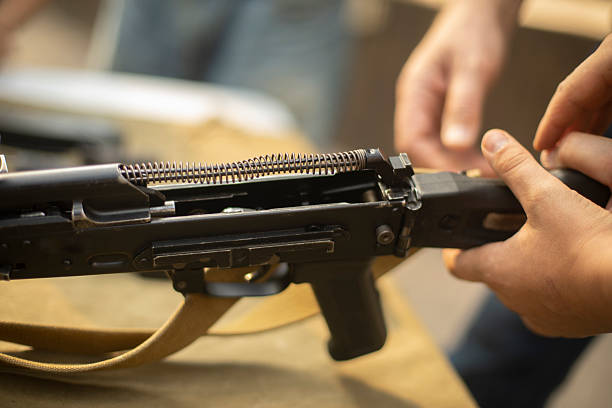 istock Military training. Assembly of automatic weapons. Military skills training. 2208005568