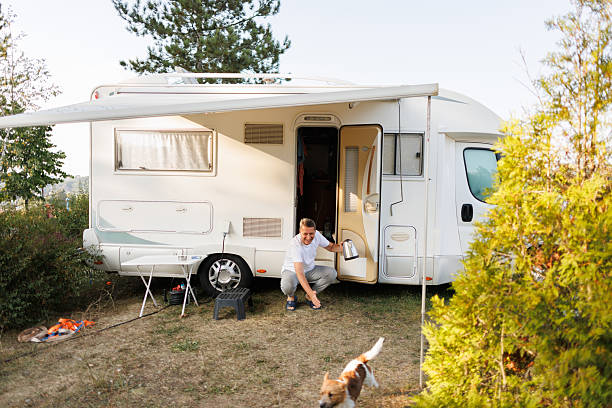 istock Leisurely Morning Scene at Campsite with Camper Van 2208005823