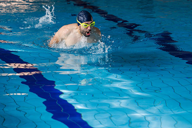 istock Strength, Focus, and Determination in the Pool 2208008112