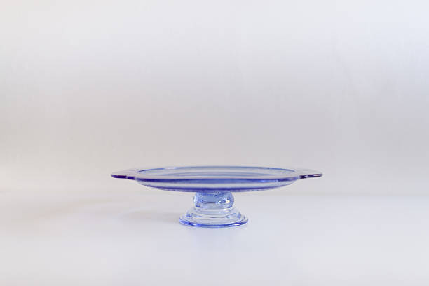 istock A Vintage Blue Depression Glass Cake Stand with a White Background 2208008170