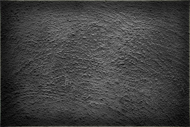istock Closeup of plastered gray wall with cracks. 2208011495