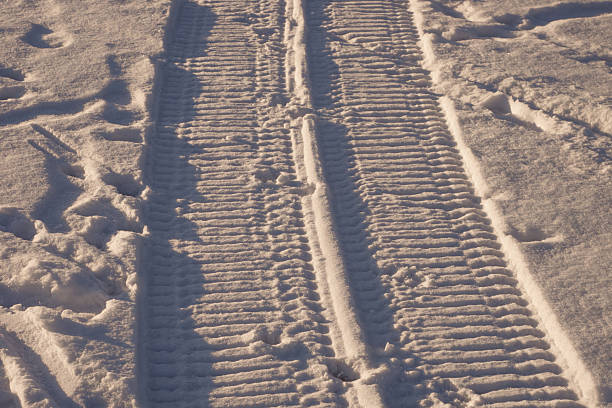 Photo of track of snowmobile in snow