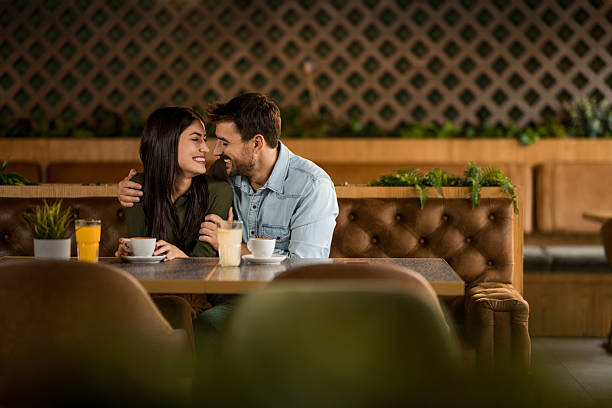 istock Happy couple dating in cafeteria. 2208024948