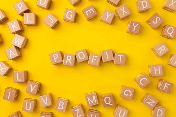 istock Block Words with Profit on a Yellow Background 2208025560