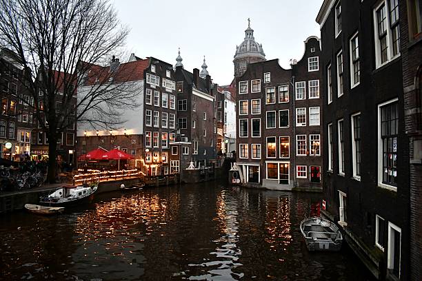Some of the beautiful, colorful, and unique buildings and architecture by the canals of Amsterdam, Netherlands
