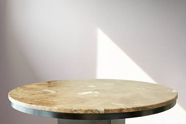 istock Round marble table top with abstract shadow drop on white wall background for mockup product display 2208027596
