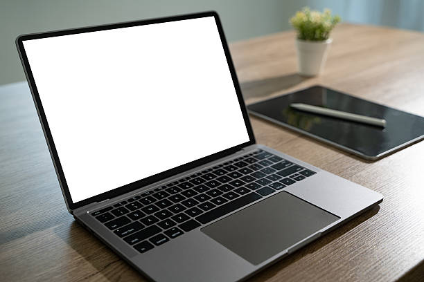 istock Laptop with blank screen on table. Workspace background new project on laptop computer with blank copy space screen for your advertising text message 2208028661