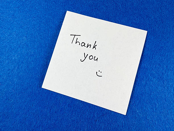 istock Sticker with text “Thank you” on blue background 2208038492
