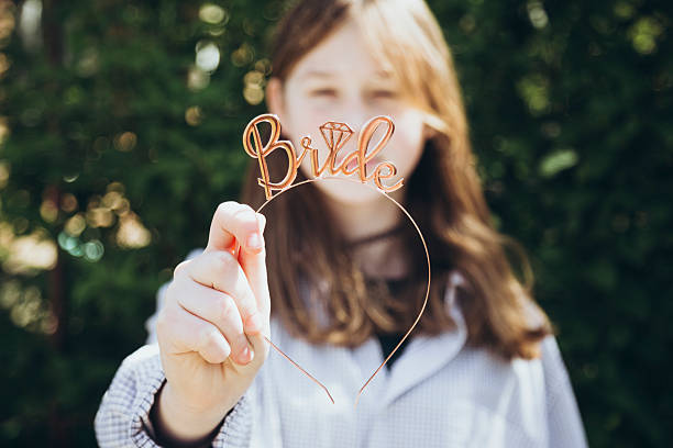 Female bride accessories, hair holder. The inscription bride on the headband. Female bride accessories, hair holder. The inscription bride on the headband. Wedding decoration, accessories for a bachelorette party, wedding hoop. Female hoop, hairpin for the bride to be party. hoops wedding stock pictures, royalty-free photos & images