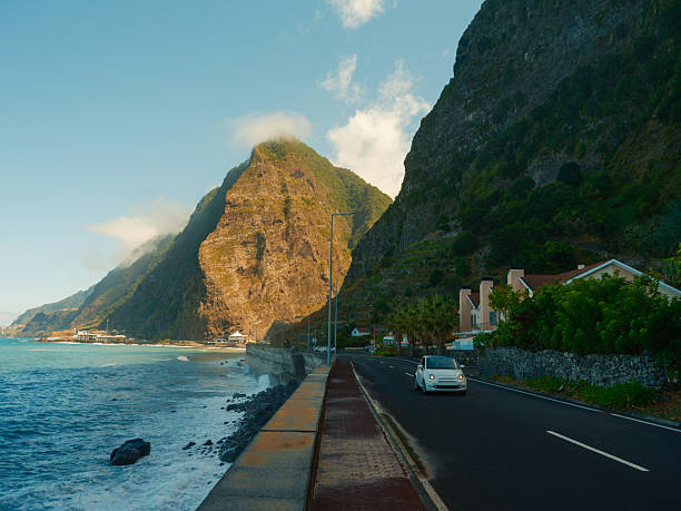 istock Waves crashing on the road on Madeira island 2208040383