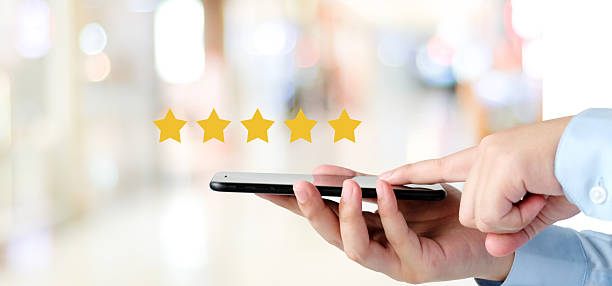 istock Customer Experience, A user give excellent rating to product and service experience, Customer review for satisfaction feedback, Customer evaluate quality of service and product 2208041342