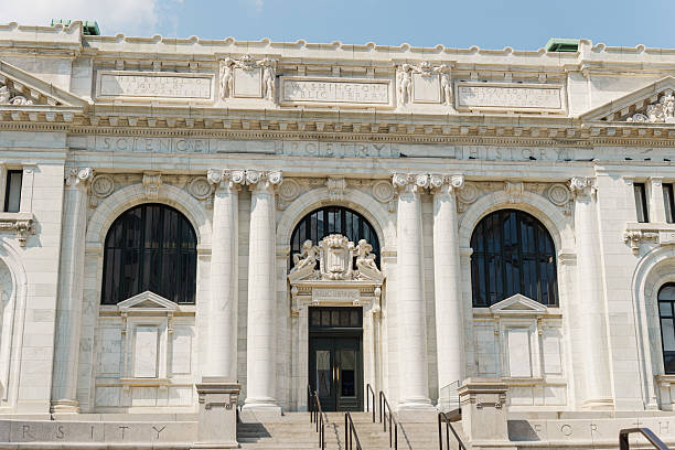 istock Historic neoclassical library facade with grand columns and carvings. 2208043032