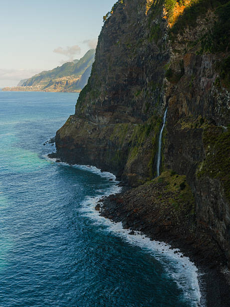 istock Scenic view of waterfall falling into Atlantic ocean on Madeira island 2208045099