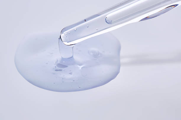 istock Pipette with delicate blue serum close-up. 2208051328