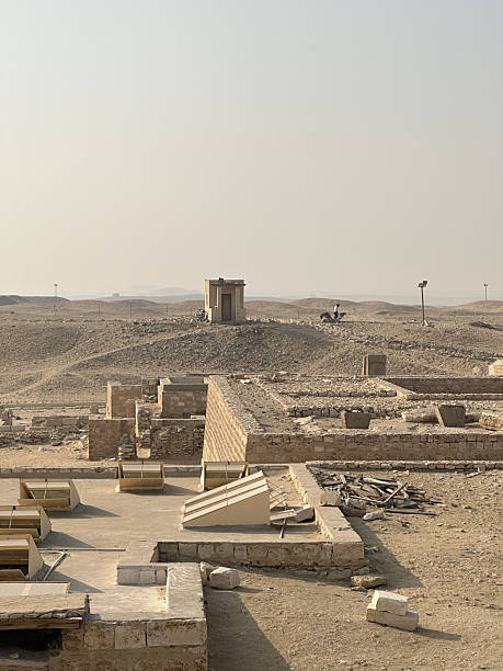 istock An Egyptian and camel at Pyramid Complex of Djoser 2208055386