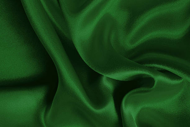 istock Dark green fabric cloth texture for background and design art work, beautiful crumpled pattern of silk or linen. 2208058408