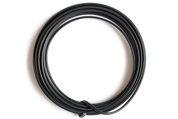 A coil of aluminum electrical wire on a white background. Aluminum wire in PVC insulation.