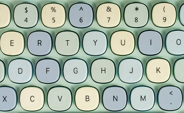 istock Close up of a modern computer keyboard with a cute, contemporary blue design seen from above. 2208067486