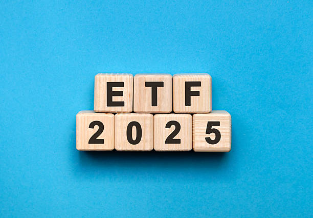 istock ETF 2025 - text on wooden cubes, on wooden background 2208068178