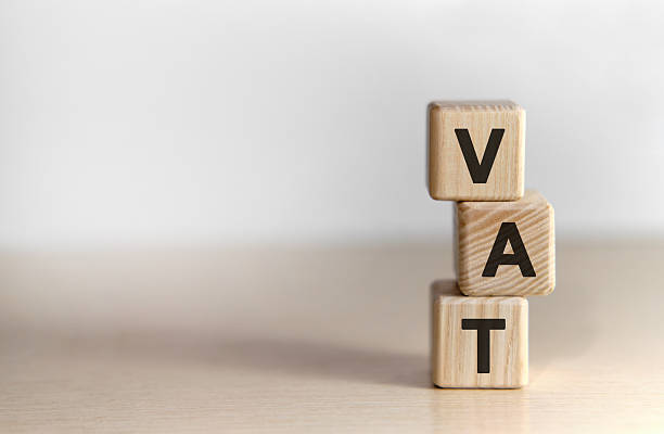 istock VAT - text on wooden cubes text on a background 2208068198