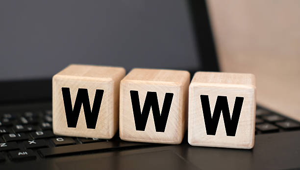 istock WWW text on wooden cubes on black keyboard 2208068200