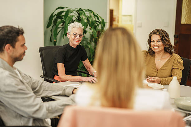 istock Inclusive design team collaborating in a plant-filled workspace 2208071766
