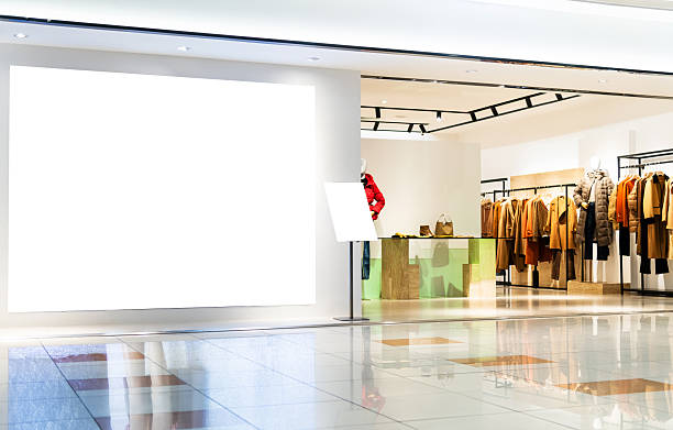 istock Blank billboard on clothing store wall 2208072641