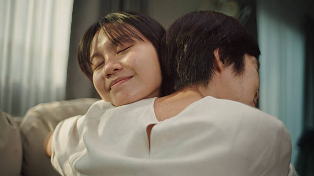 istock Mother and daughter hugging. 2208079073