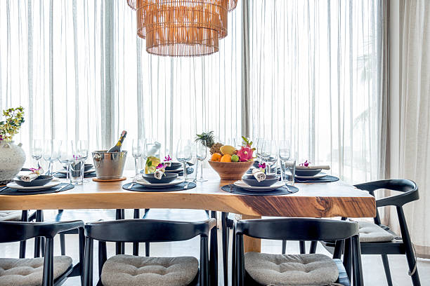 istock The intimate dining room atmosphere, elegant dining equipment and warm lighting create an inviting dining atmosphere 2208086600