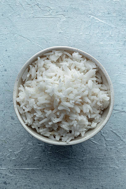 istock White rice, cooked. A bowl of boiled long grain rice, a simple side dish 2208087824