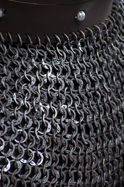 istock Interlocking Metal Rings Chainmail Texture. Medieval armor detail showcasing connected iron links. 2208089704