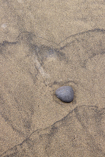 istock Abstract view on sand and a pebble, Gran Canaria, Spain 2208094368
