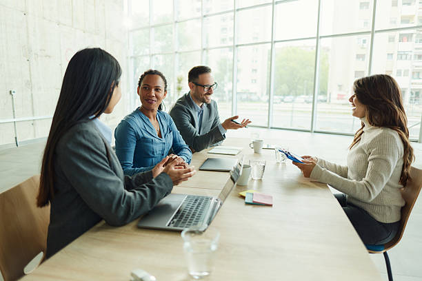 istock Mixed race human resource team talking to a candidate on a job interview. 2208095247