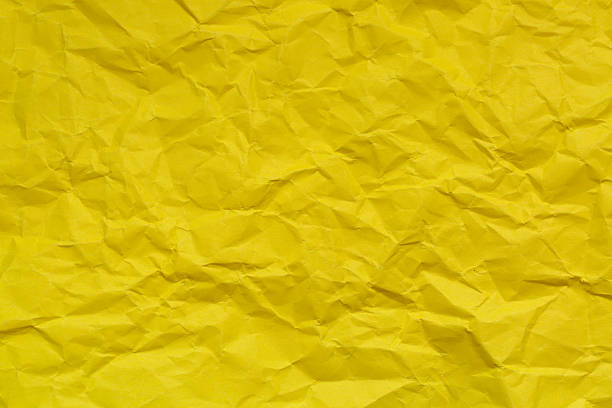 istock Yellow crumpled paper backdrop,Yellow Crumpled Paper Texture Background Wallpaper 2208095309
